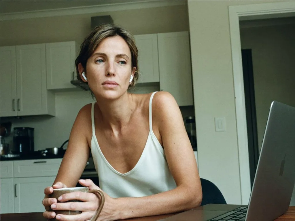 Woman listening during an online psychosexual therapy session